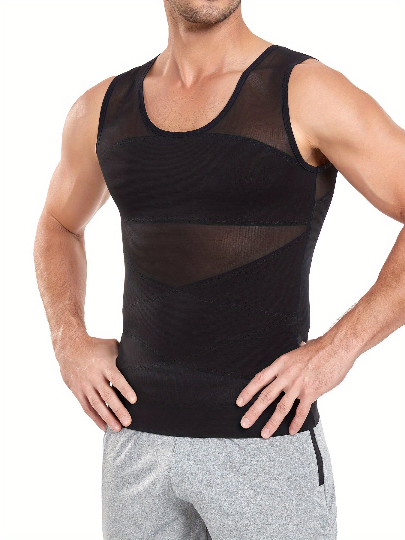 Slimming compression shirt for men with invisible tummy control. Made with a breathable mesh and ribbed nylon-spandex blend. Sleeveless design and crew neck for all-day wear. Slimming