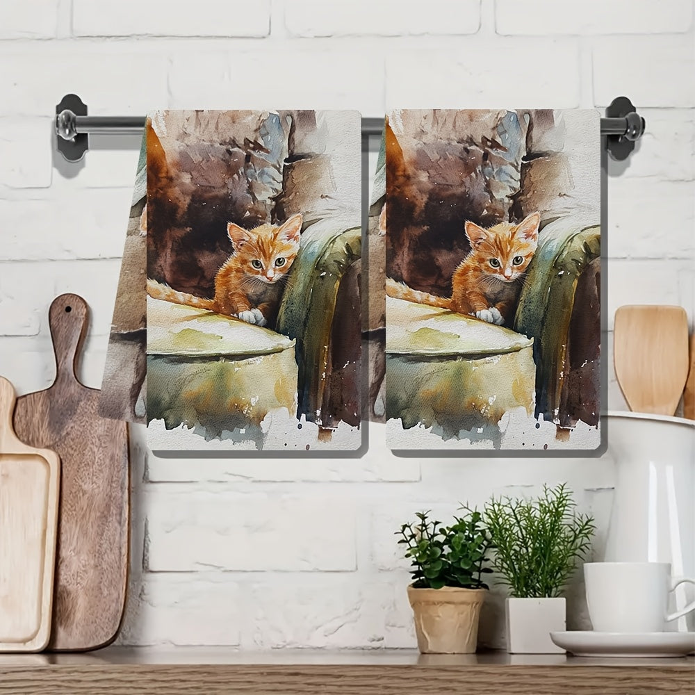 Two pieces of ultra soft kitchen towels featuring an adorable peekaboo kitten design. These towels are highly absorbent and machine washable, making them perfect for use as dish hand towels. Add a cozy touch to your home decor with these towels