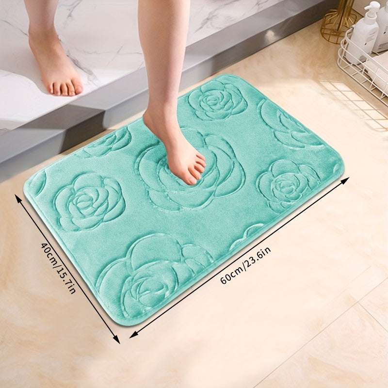 Soft and luxurious bath mat featuring a beautiful rose embossed design. This non-slip bathroom rug is made of ultra-soft knit polyester, providing superior comfort and absorbency. Lightweight and washable, this versatile mat is perfect for use in the