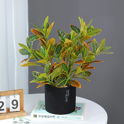 Stylish artificial croton plant with variegated leaves for home decor, perfect for any occasion - pot not included.