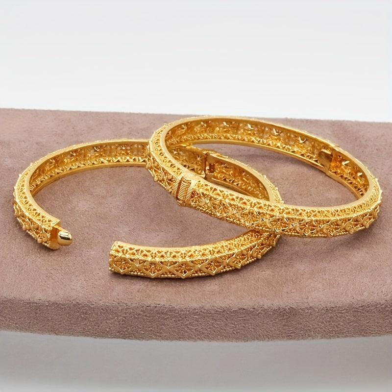 A set of four 24K golden plated bangle bracelets, luxurious and alluring zinc alloy jewelry inspired by Middle Eastern and African styles. Perfect for women to wear daily or to parties, music festivals, or as Ramadan gifts. Suitable for all seasons.