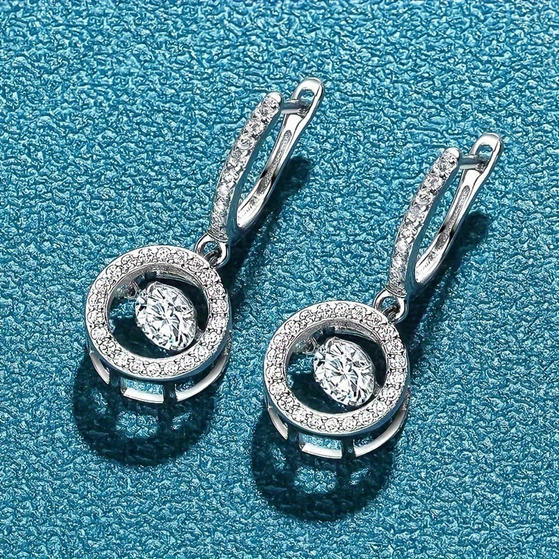 These Moissanite Smart Stud Earrings are crafted from 925 Sterling Silver and showcase a new fashion and elegant design. With a sense of luxury, these earrings are perfect for casual or classic occasions. They make a simple yet stunning gift for