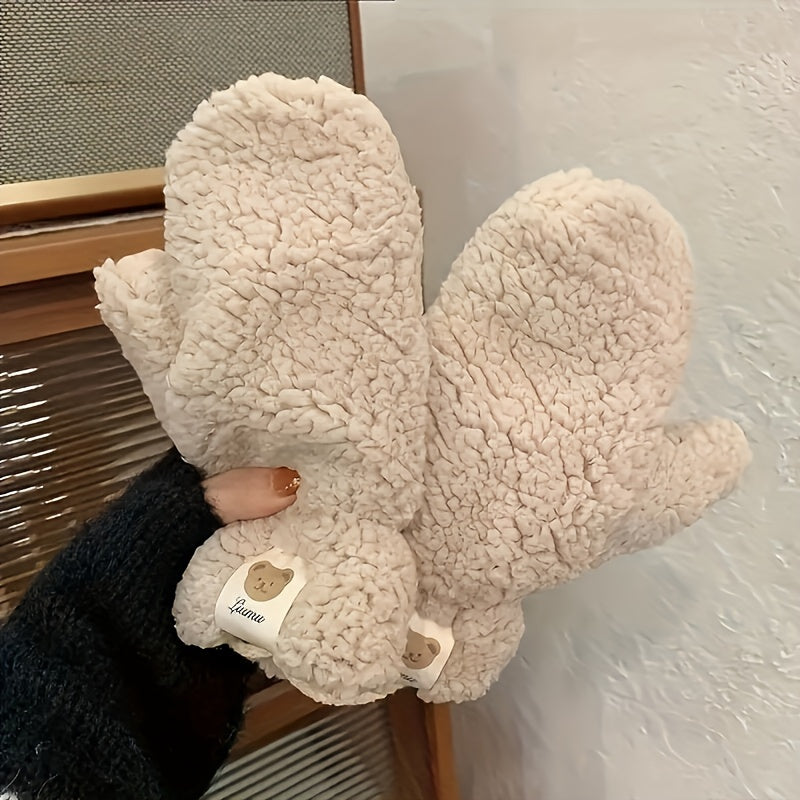 Stay cozy this winter with our adorable Animal Pattern Cashmere Mittens. Made from 100% cashmere, these gloves are not only warm and elastic but also hand washable for easy maintenance. Featuring a cute animal design, these plush mittens come in 3 colors