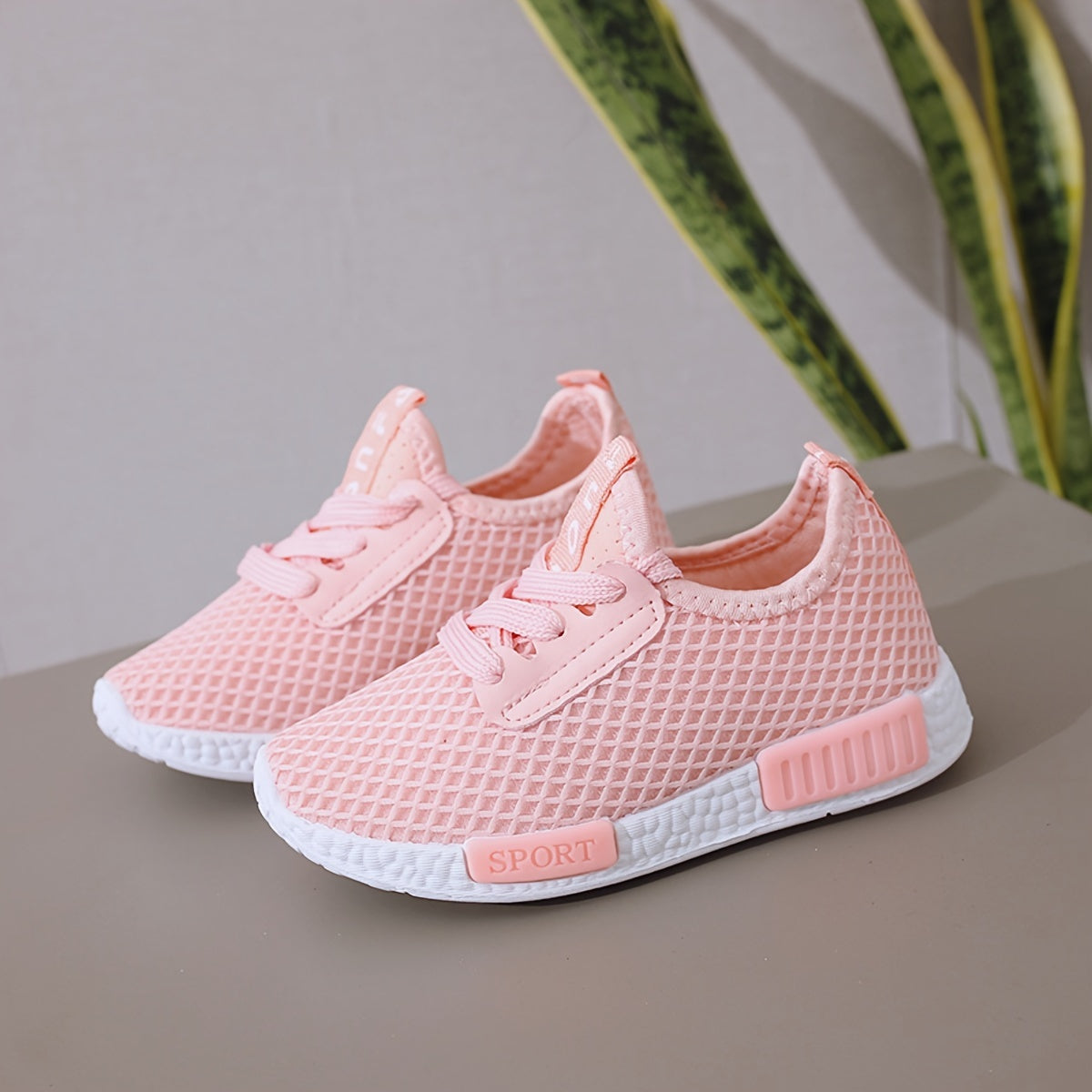 Breathable mesh sneakers for boys and girls, lightweight with lace closure and comfortable PVC sole.