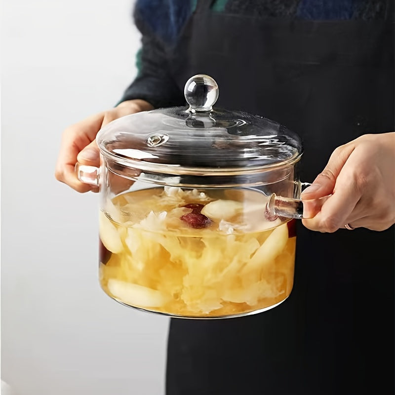 Transparent cooking pot with lid, resistant to high temperatures for gas stoves. This mini soup pot is made of high borosilicate glass, perfect for household use. It has a thickened large capacity, ideal for making supplementary food, soup, or stew.