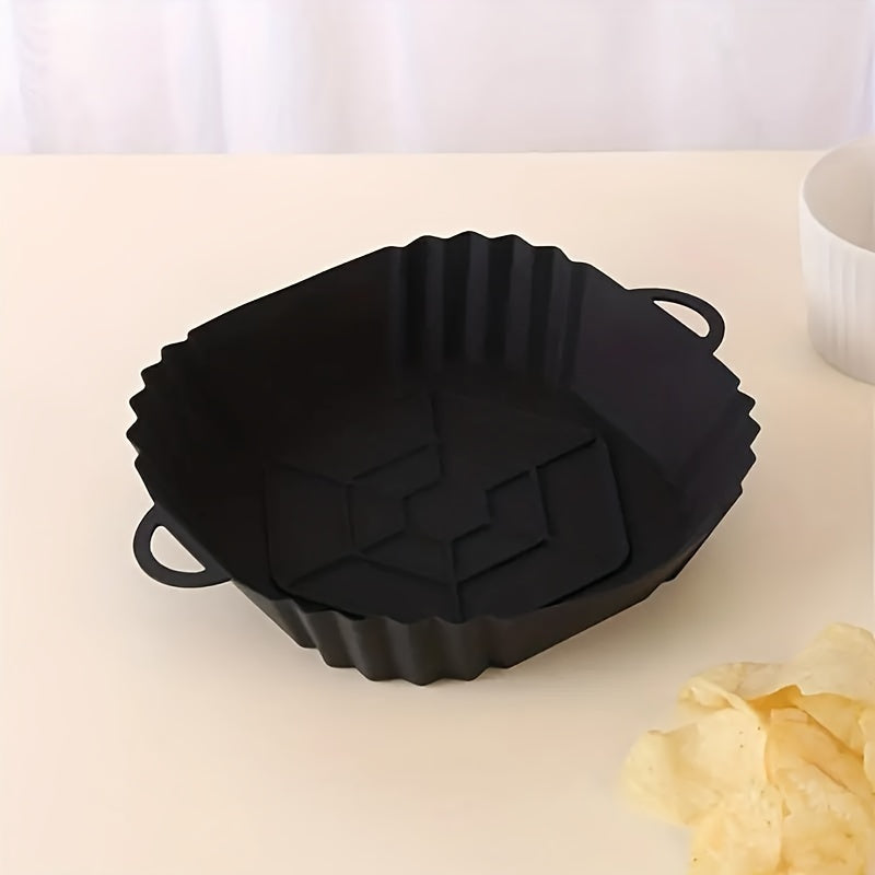 Get a square-shaped 1-piece reusable silicone air fryer baking pan that is non-stick and heat resistant up to 240°C. It comes with textured grip handles for easy handling and is perfect for making crispy chicken and more. An essential kitchen accessory