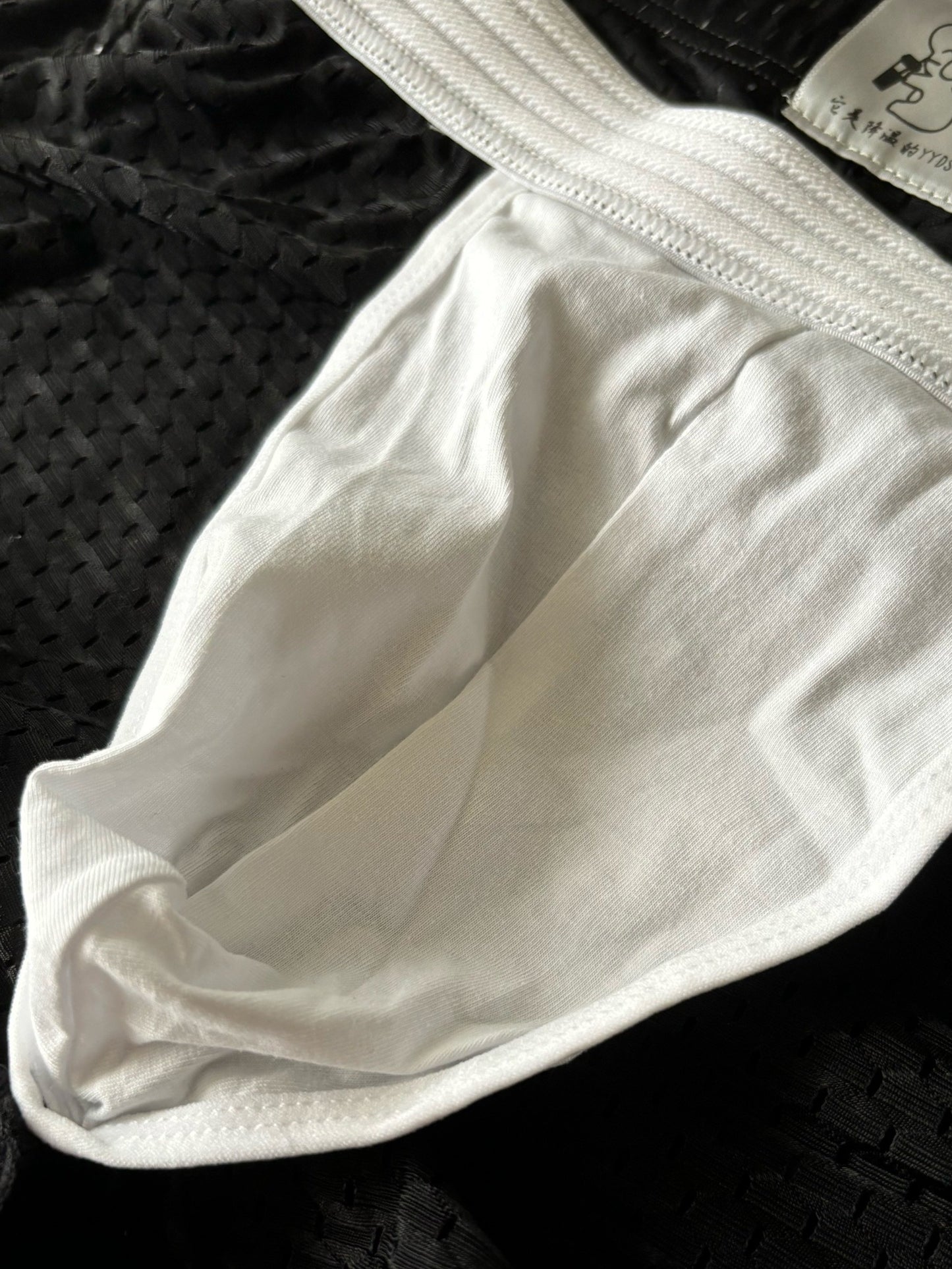 Breathable mesh boxer briefs for men with a comfort fit and contrast trim, suitable for everyday wear and sleepwear.