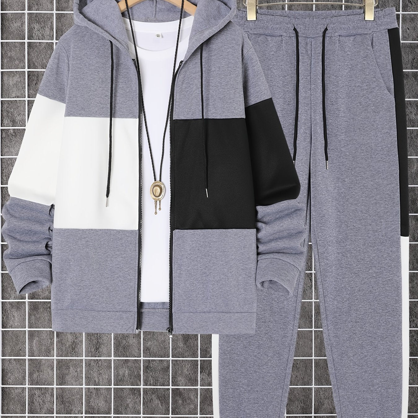 Men's 2-piece color block athletic tracksuit with long sleeve zip up hoodie, drawstring, and jogging pants for gym workouts and running.