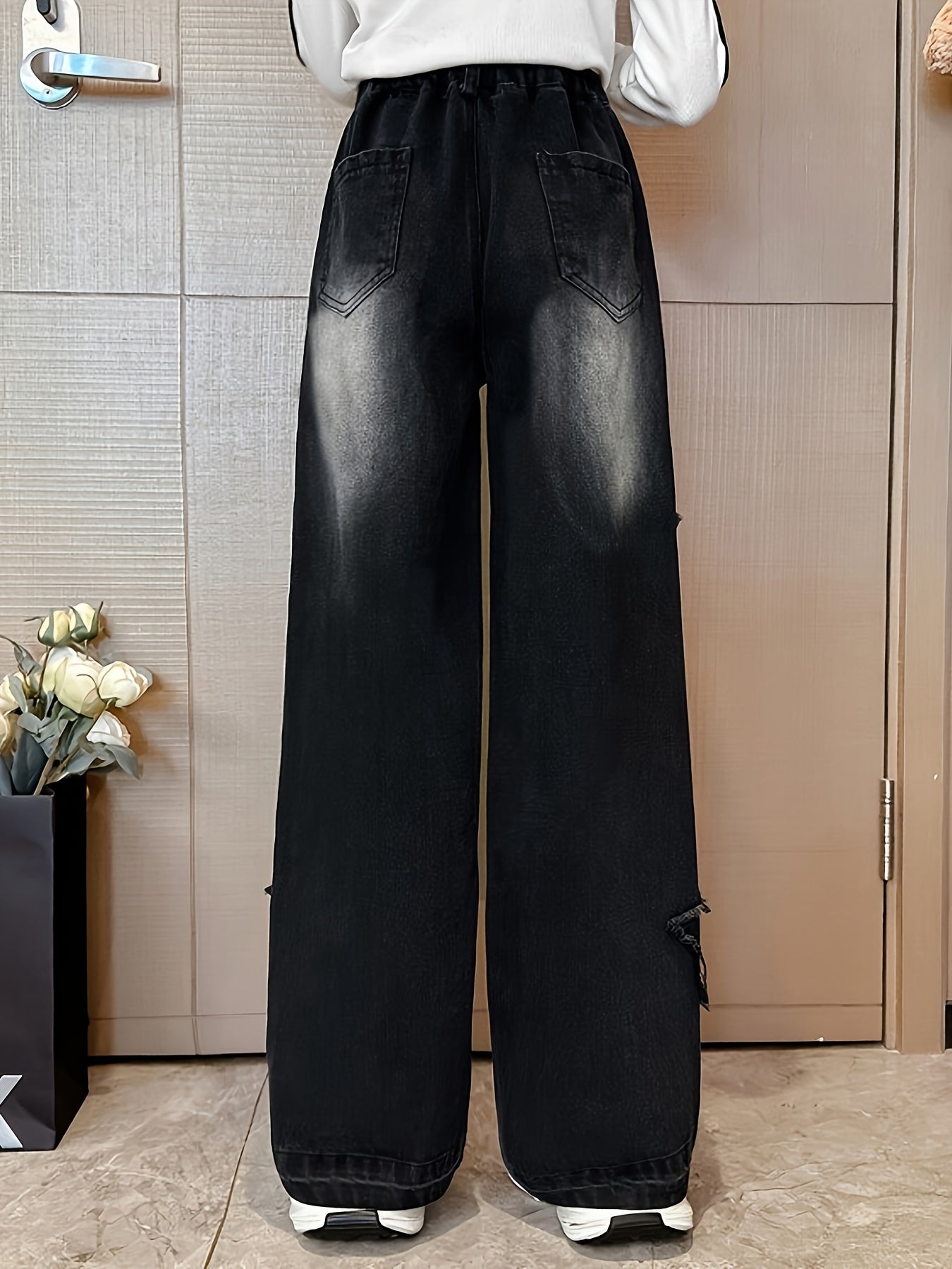 Girl's loose jeans with a star design, high waist, and wide-leg fit for everyday casual wear.