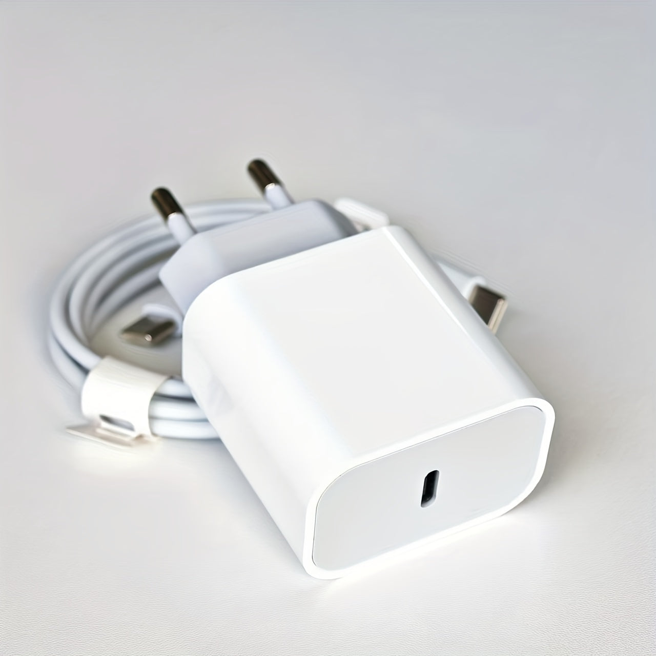 Compact 10W USB-C charger with EU plug, great for European travel, works with iPhone, iPad, Galaxy, and other USB-C devices, ensures safe and smart power delivery.