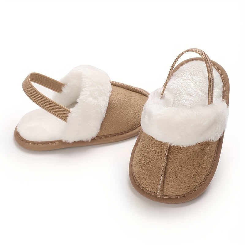 Soft and cozy plush baby girl slippers with non-slip sole for indoor comfort, perfect for 0-1 year olds in spring and fall.