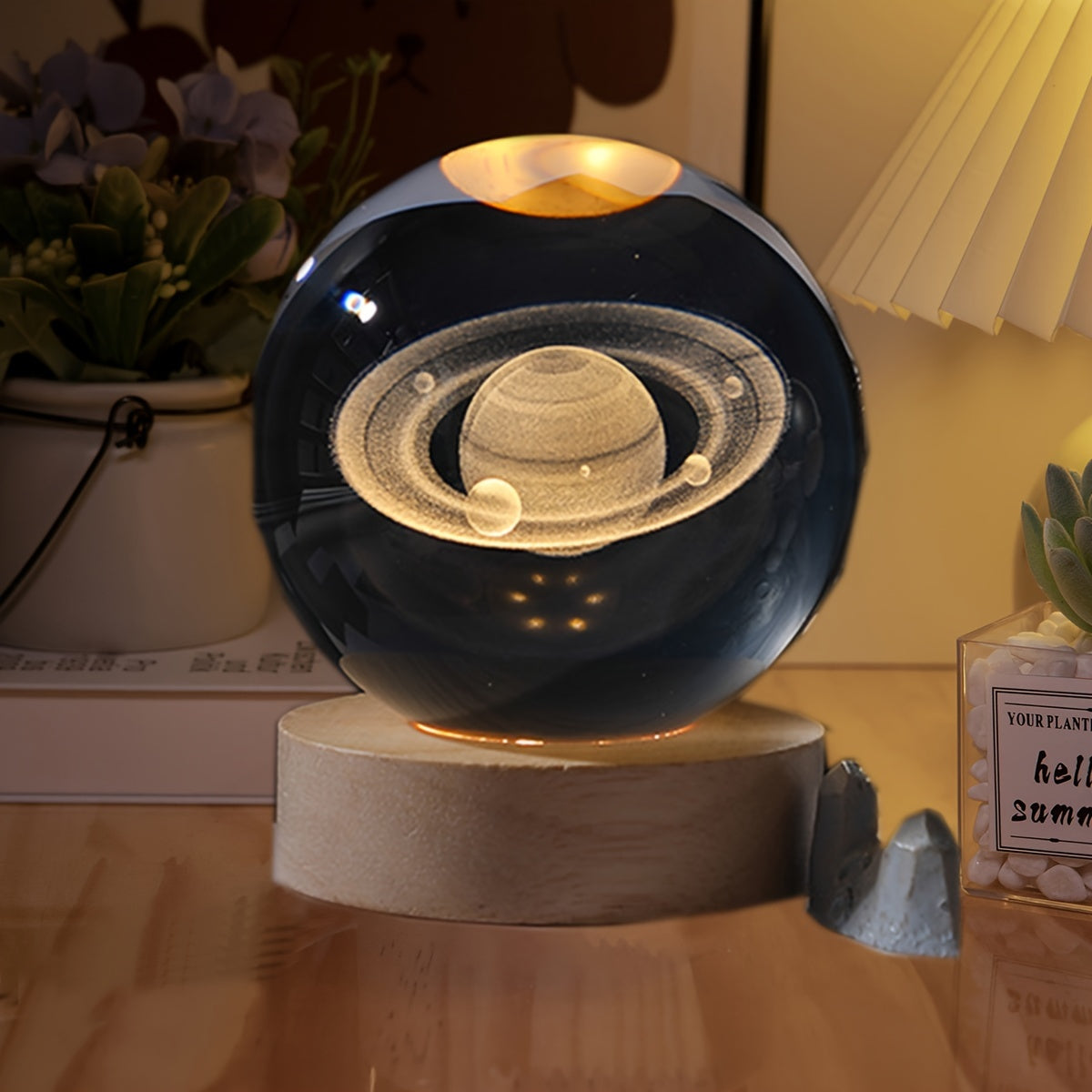 USB-powered Crystal Saturn night light emits celestial glow.