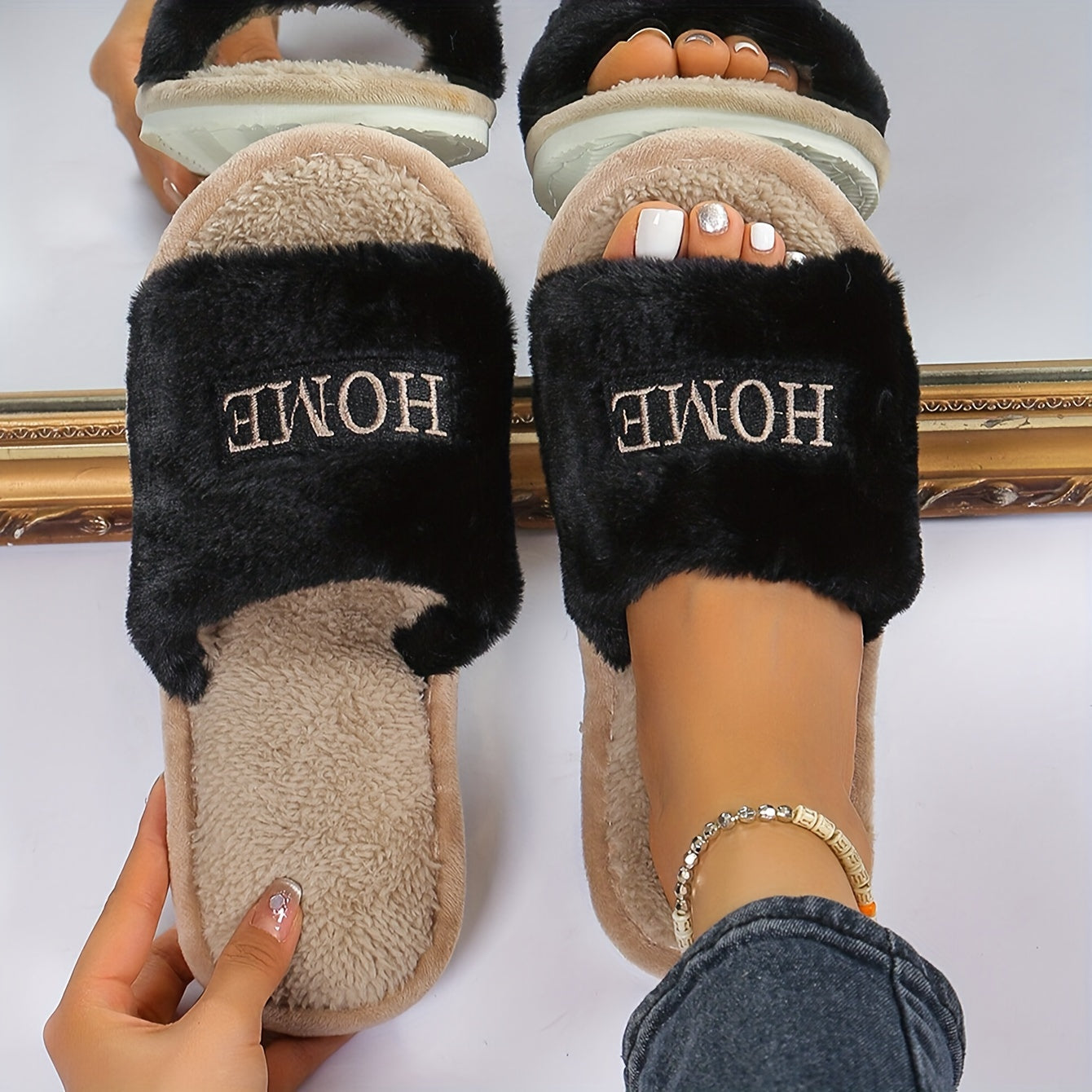 White plush slippers with "HOME" embroidery, cozy and comfortable for all seasons.