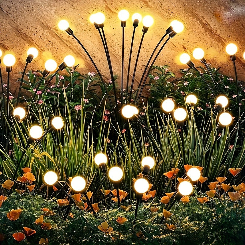 12LED solar firefly light for outdoor decoration in gardens, cafes, parks, and commercial spaces. Can be used as landscape or lawn lighting.