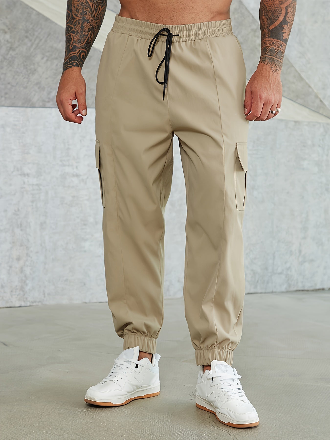 Solid cargo pants for plus size men, ideal for sports and outdoor activities.