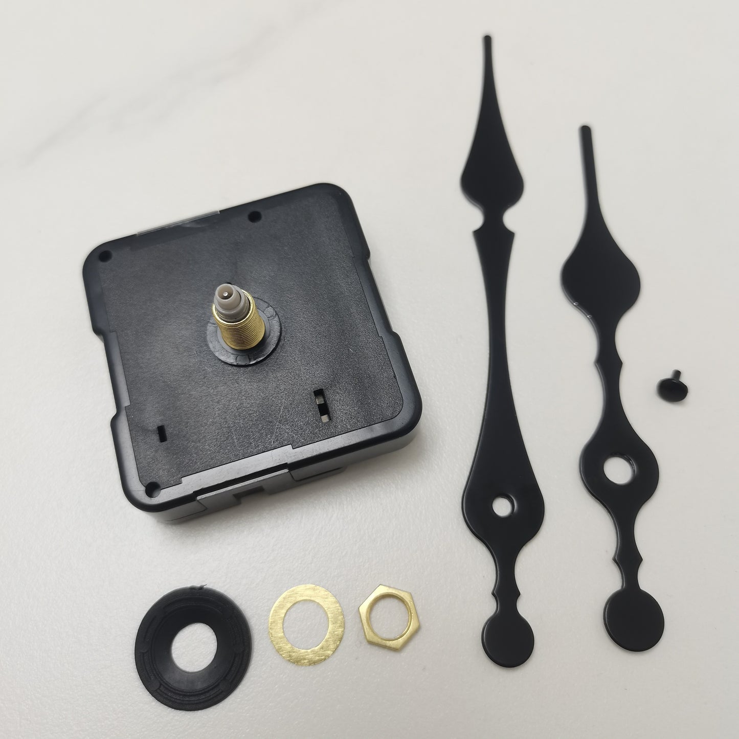 DIY Quartz Clock Kit includes clock movement, hands, and maintenance manual for home decoration.