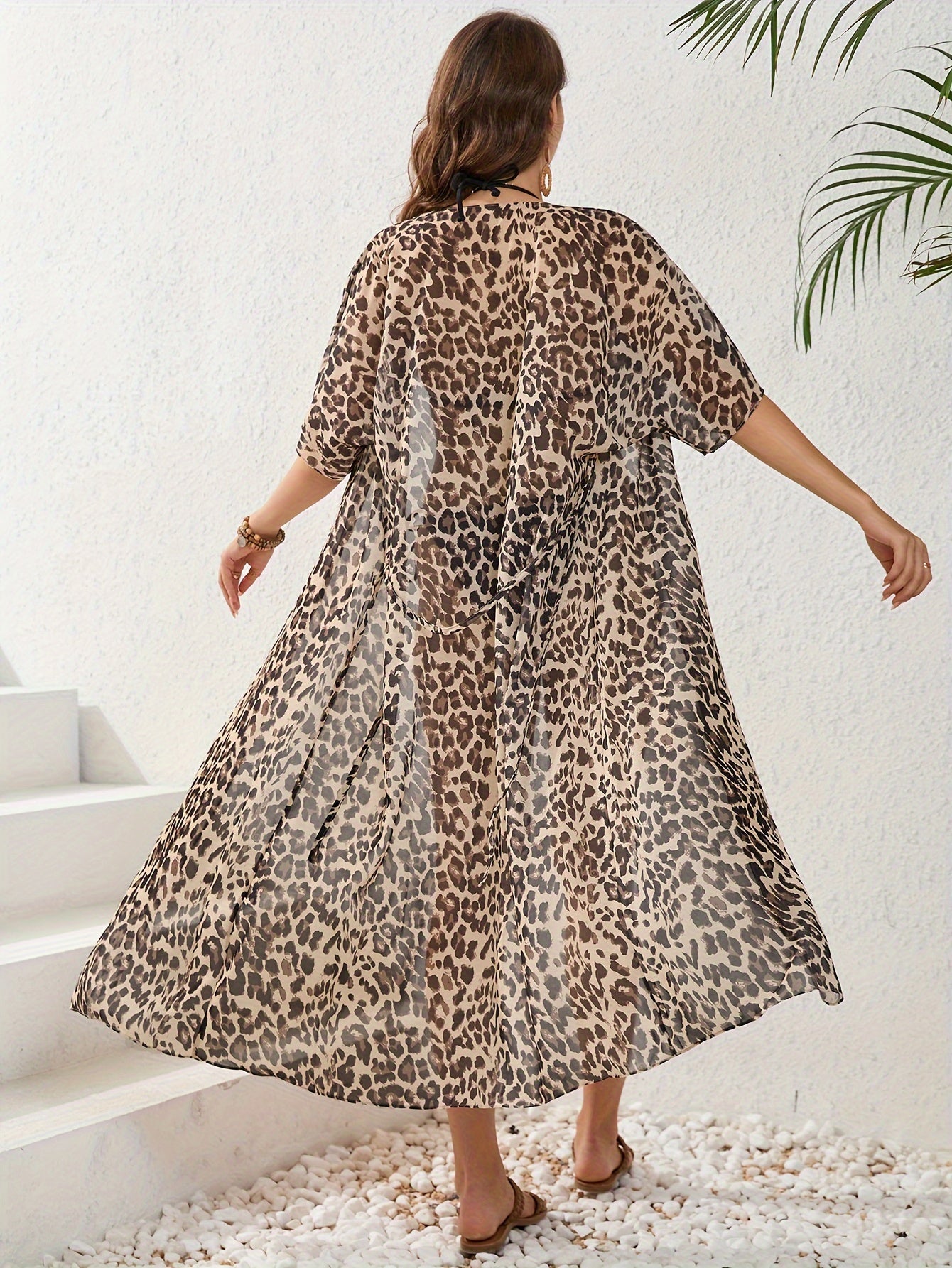 Leopard print kimono-style beach cover-up for women.