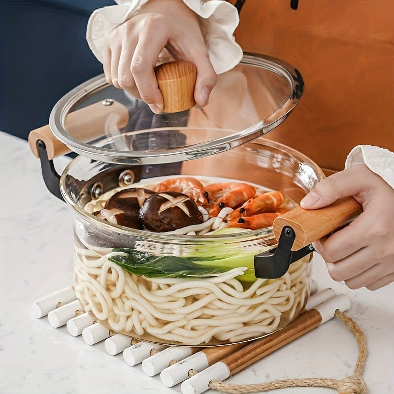 This soup pot with a lid and double wooden handle is perfect for cooking a variety of dishes. Made of safe glass, this household kitchen glass cooker is ideal for making pasta, noodles, soup, juice, and milk. Complete your kitchen supplies with this