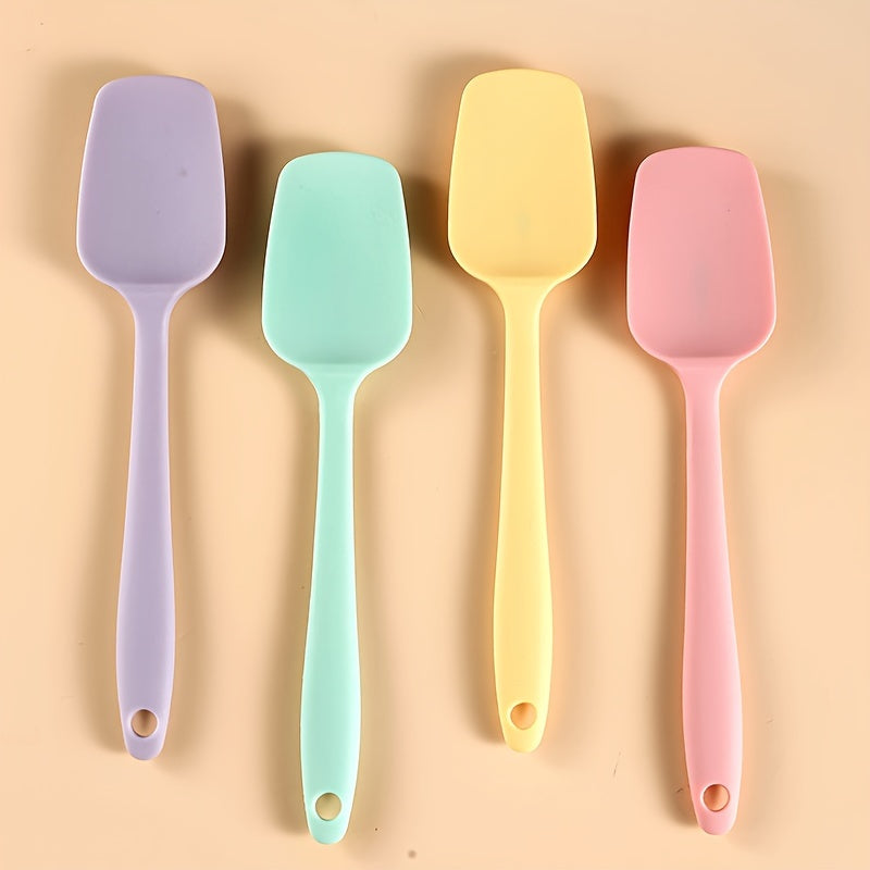 Set of 5-6 silicone spatulas, perfect for scraping cake cream and applying oil while baking. These tools are food-grade and also include a brush, making them essential kitchen gadgets and accessories.