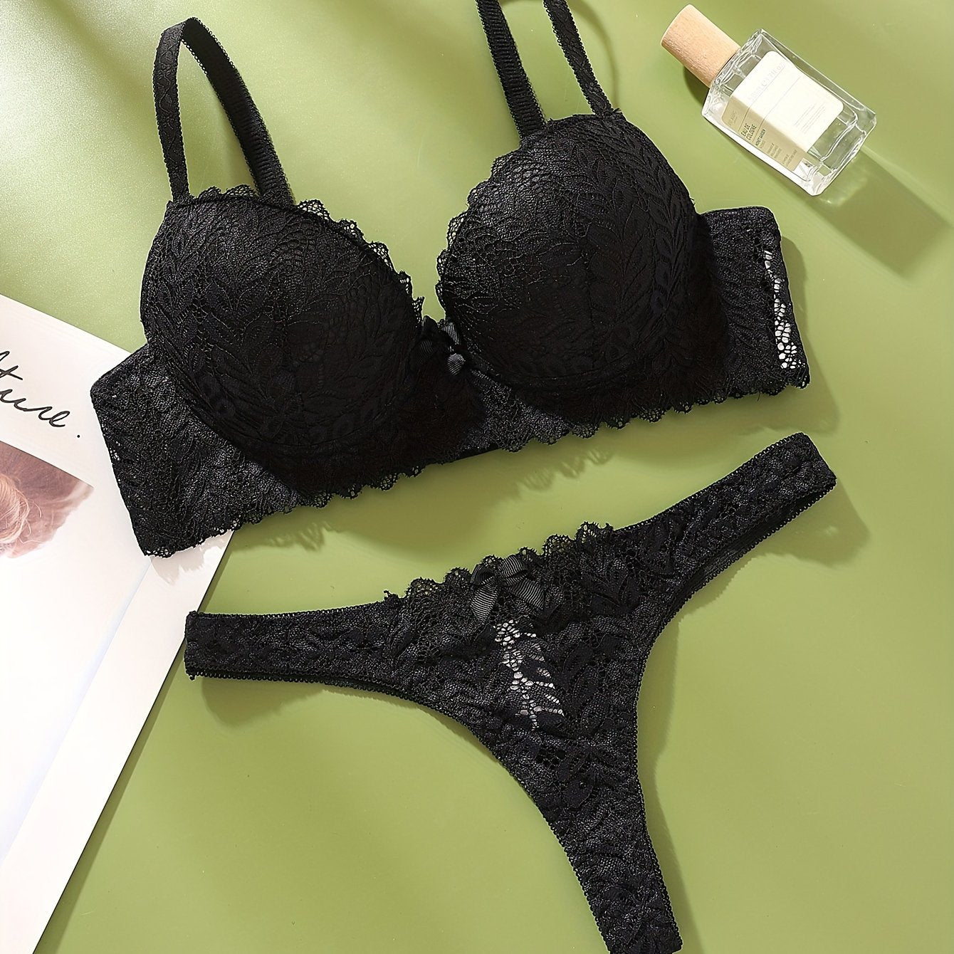 Women's Sexy Lace Bralette and Thong set made of 90% Polyamide and 10% Elastane. It offers breathable comfort, medium support, and a drop waist design.