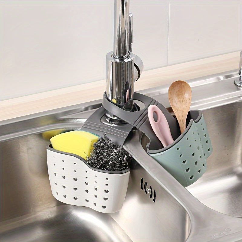 Introducing the BANUCHE Dual-Layer Sink Organizer - a versatile kitchen storage rack featuring heart-shaped handles, faucet hanging sponge, and utensil basket. Available in beige, gray, and blue, this durable plastic organizer requires no power and is