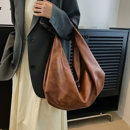 Fashionable vegan hobo bag with large capacity for women.