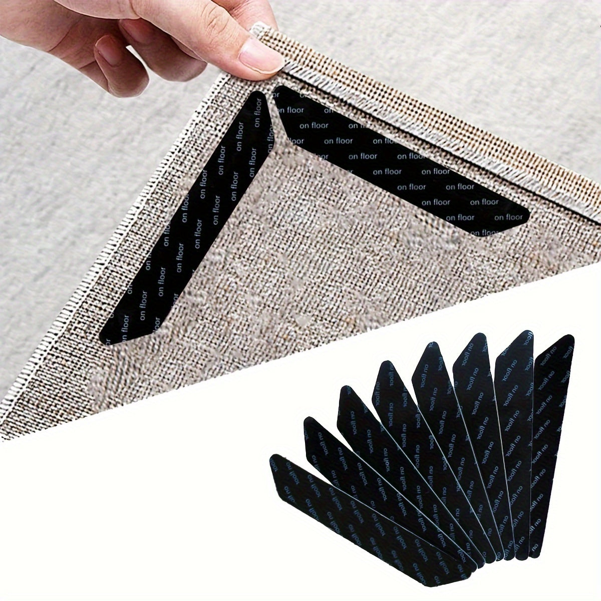 Reusable and washable rug pads for secure corner flattening on hardwood, tile, and carpet floors. These large anti-slip carpet grippers come in black.