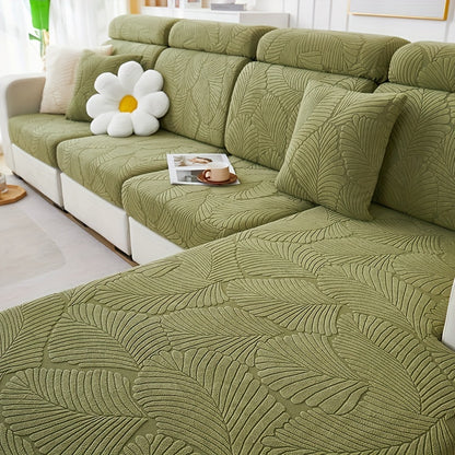 Stylish leaf-patterned sofa cover fits single to four-seater sofas in various colors. Durable jacquard fabric, machine washable.