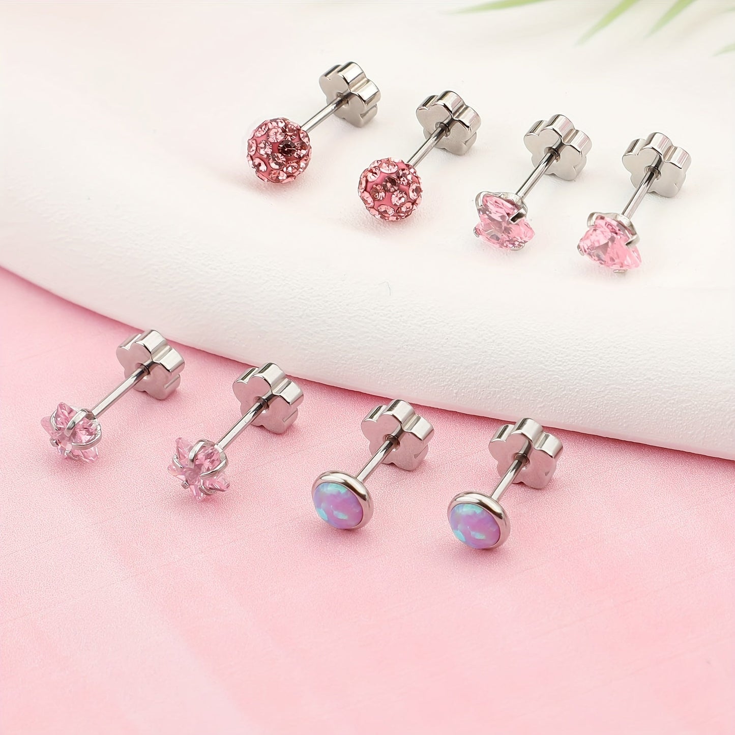 These hypoallergenic flat back earrings are perfect for women with sensitive skin. Made of Star Heart protein stone, they feature a European screw back design and are available in pink, silver, and AB colors. Suitable for men, women, and girls alike.