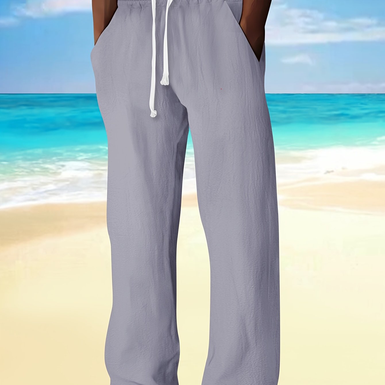 Men's casual drawstring pants made of cotton linen blend fabric. Features relaxed fit, straight leg with pockets, and a beach-inspired design. Ideal for spring and fall.