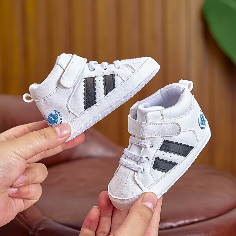 Unisex baby sneakers with adjustable strap closure, PU upper, soft fabric sole, anti-slip for spring/fall - perfect for everyday wear.