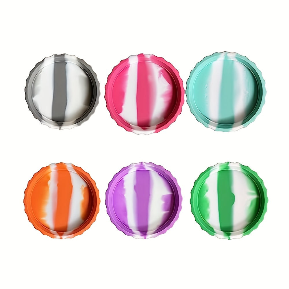 Six silicone soda can lids that prevent spills and fit standard soda cans. They come in a variety of colors and can also be used to cover juice and beverage cans.