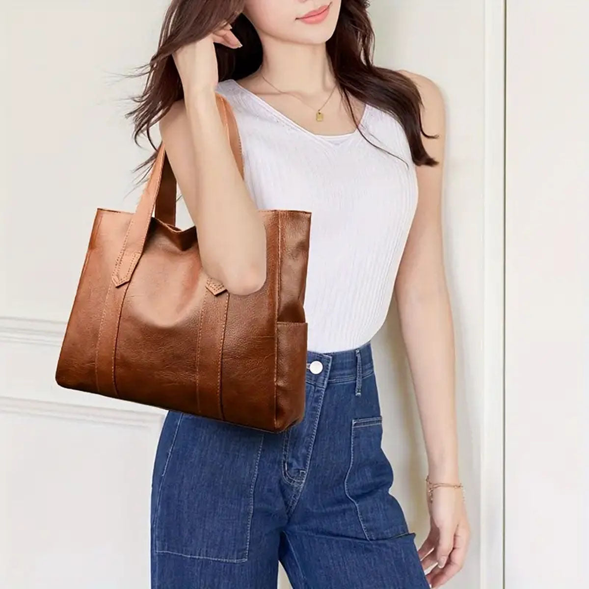 Stylish tote bag with safety zipper closure - perfect gift for women. Available in light brown, gray, or black. Spacious and versatile, perfect for daily use.