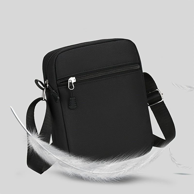 Black Oxford cloth shoulder bag with adjustable strap for daily use, hand wash or dry clean recommended.