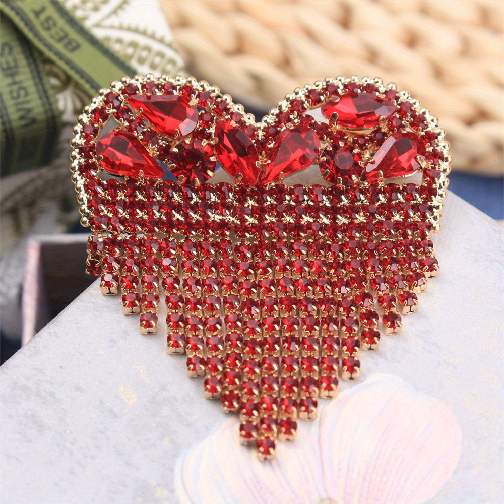 Luxurious Heart-Shaped Rhinestone Brooch Pin with Tassel, featuring an Elegant and Unique Irregular Shape. This Novelty Simulation Modeling accessory is perfect for ladies who want to make a fashion statement. Ideal for parties and also makes a great