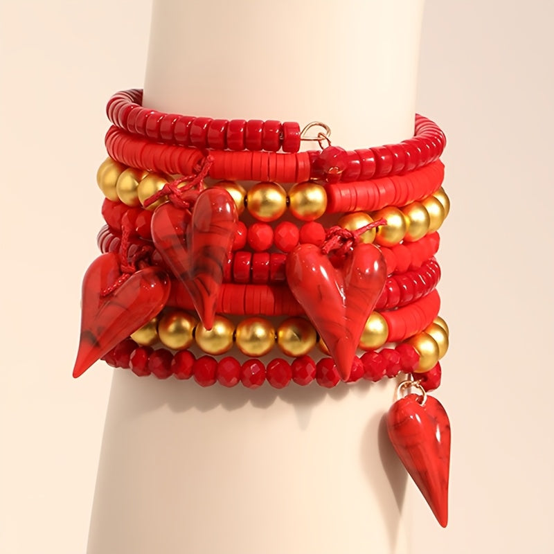 An exquisite handmade beaded heart pendant bracelet in rich red hues, boasting a Bohemian flair - the ultimate accessory for women looking to elevate their Valentine's Day ensemble with a touch of boho charm. Versatile enough for both casual and special