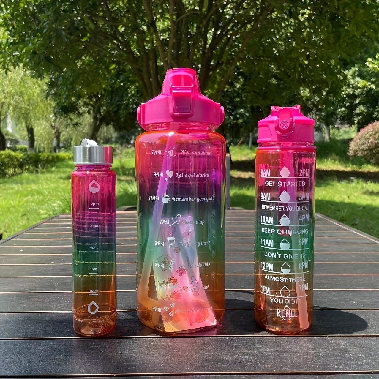 Set of 3 gradient color motivational water bottles (64oz, 32oz, 15oz) with mobile phone holder, food grade material straw cup, 2 stickers. Perfect for home and outdoor use, ideal Christmas gift.