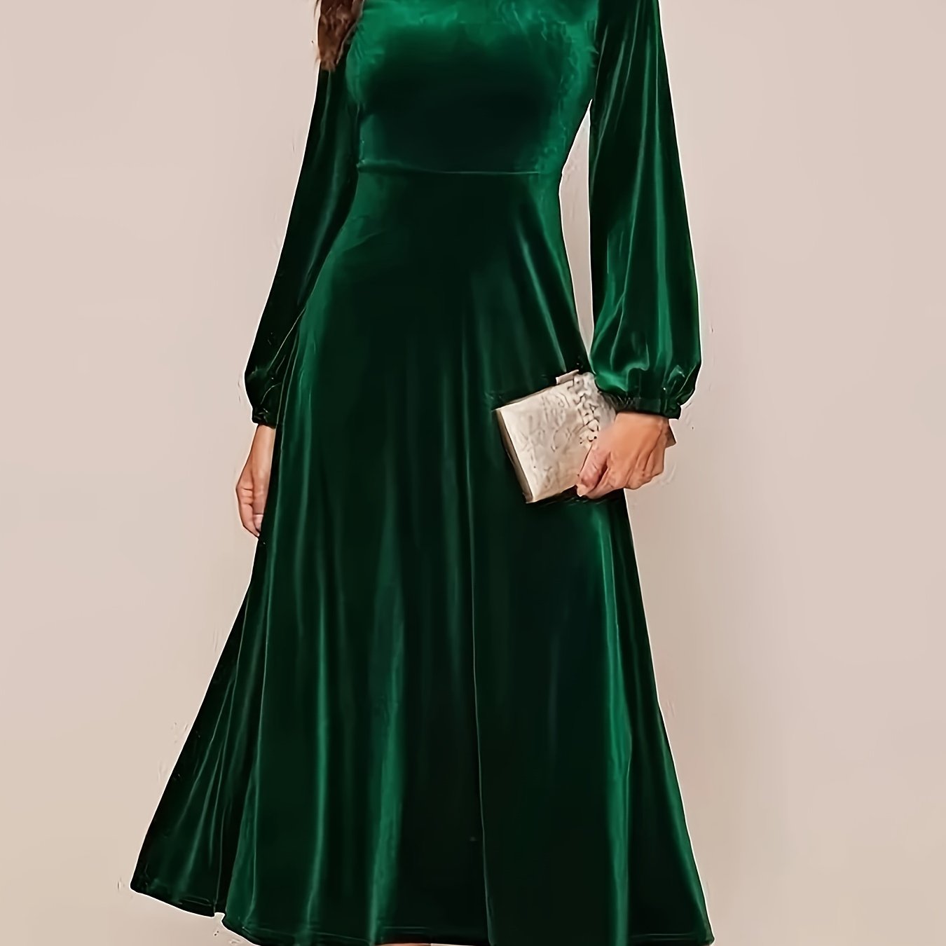 Black velvet A-line dress with flared sleeves, crew neck, and long sleeve made of polyester knit for all-season wear. Ideal for adult women's fashion as elegant attire.