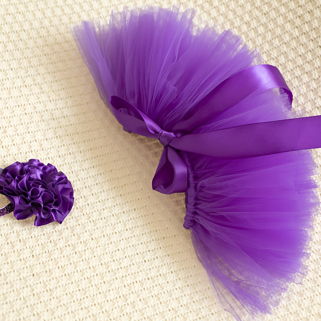 Baby Tutu Set in Purple – Includes Tutu Skirt and Headband made of Polyamide Tulle for ages 0-3, complete with coordinating Flower Headpiece. Perfect for Baby Photo Shoots, Ballet Performances, or as a Birthday and Special Occasion Costume.