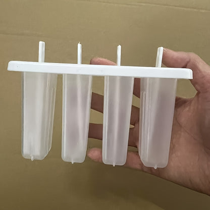 Set of 4 reusable popsicle molds with lids for making homemade frozen treats.