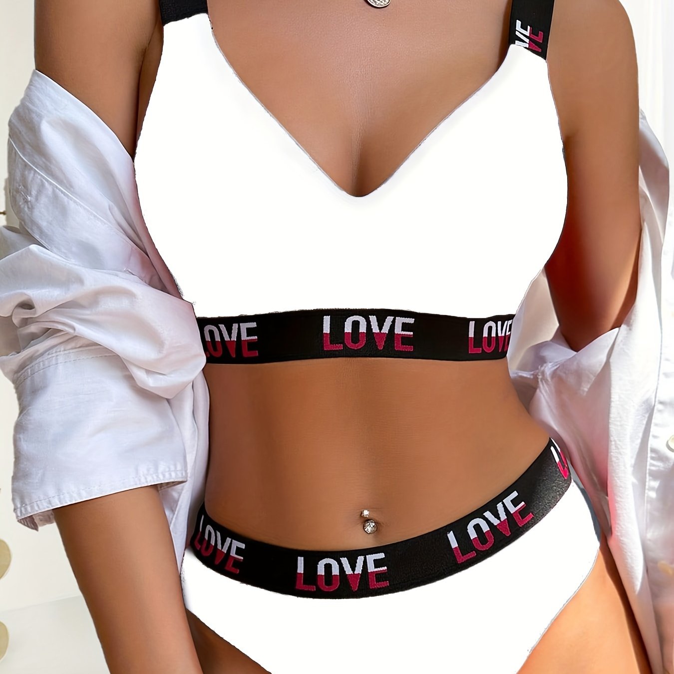 Ribbed bra and thong set with contrasting color letter print.