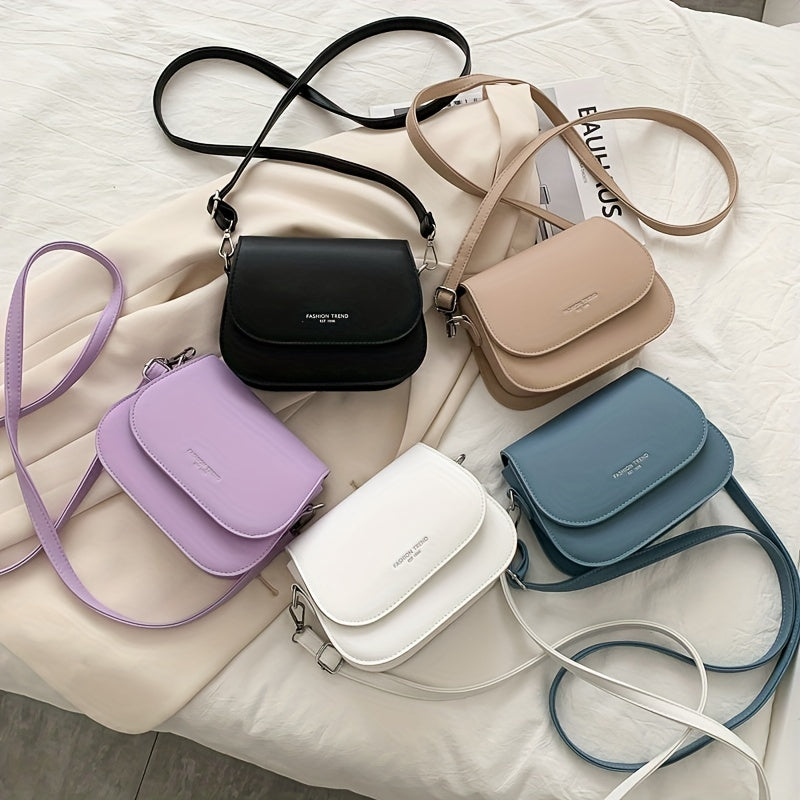 New trendy solid color crossbody bag for women, simple and fashionable shoulder saddle bag.