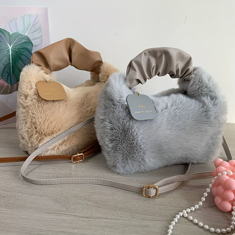 Stylish faux fur crossbody bag with zip closure, ideal for daily use.