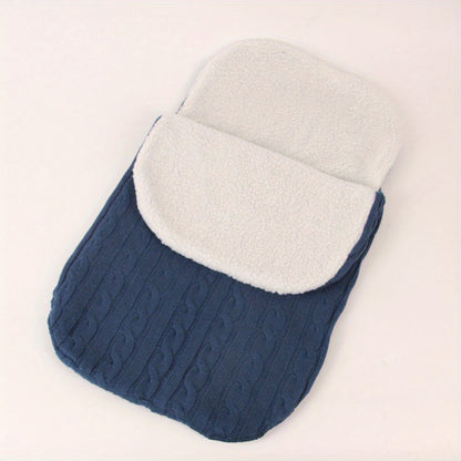 Machine washable baby foot cover with knitted microfiber filling for warmth and comfort.