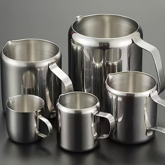 Metal latte art cups, frother pitcher, milk jug, and honey cup set for home and restaurant use.