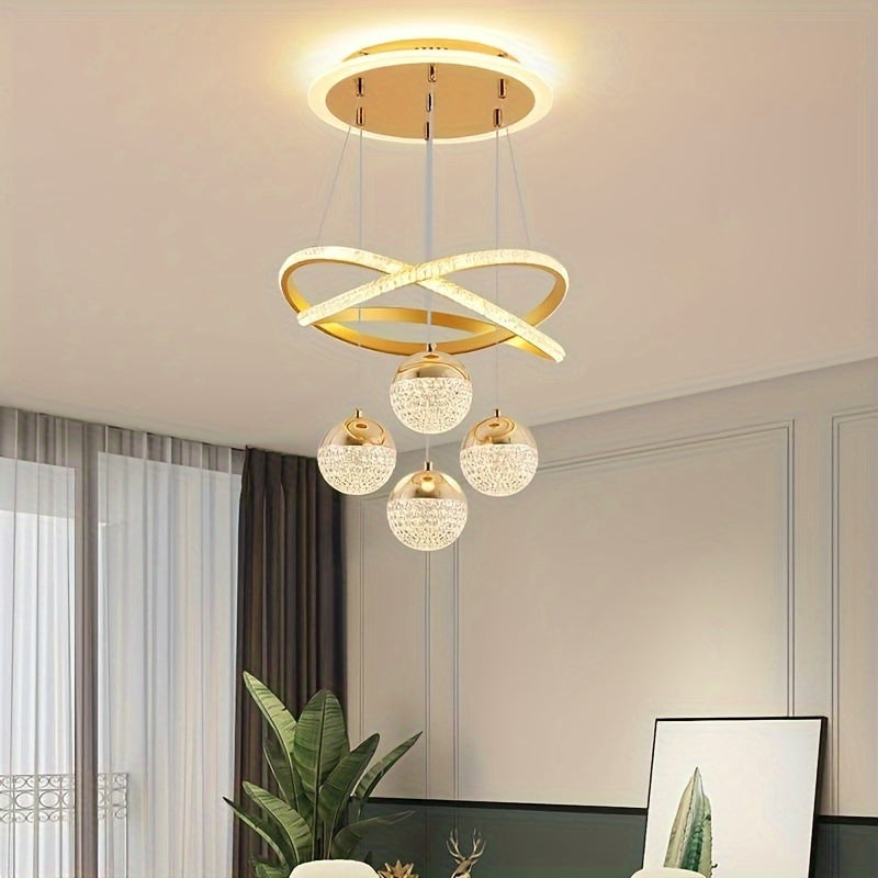 Contemporary LED chandelier with crystal embellishments and metal construction - perfect for dining rooms, living rooms, clothing stores, bars, and staircases. Includes installation hardware and features a simple, modern design. Ideal for apartments.