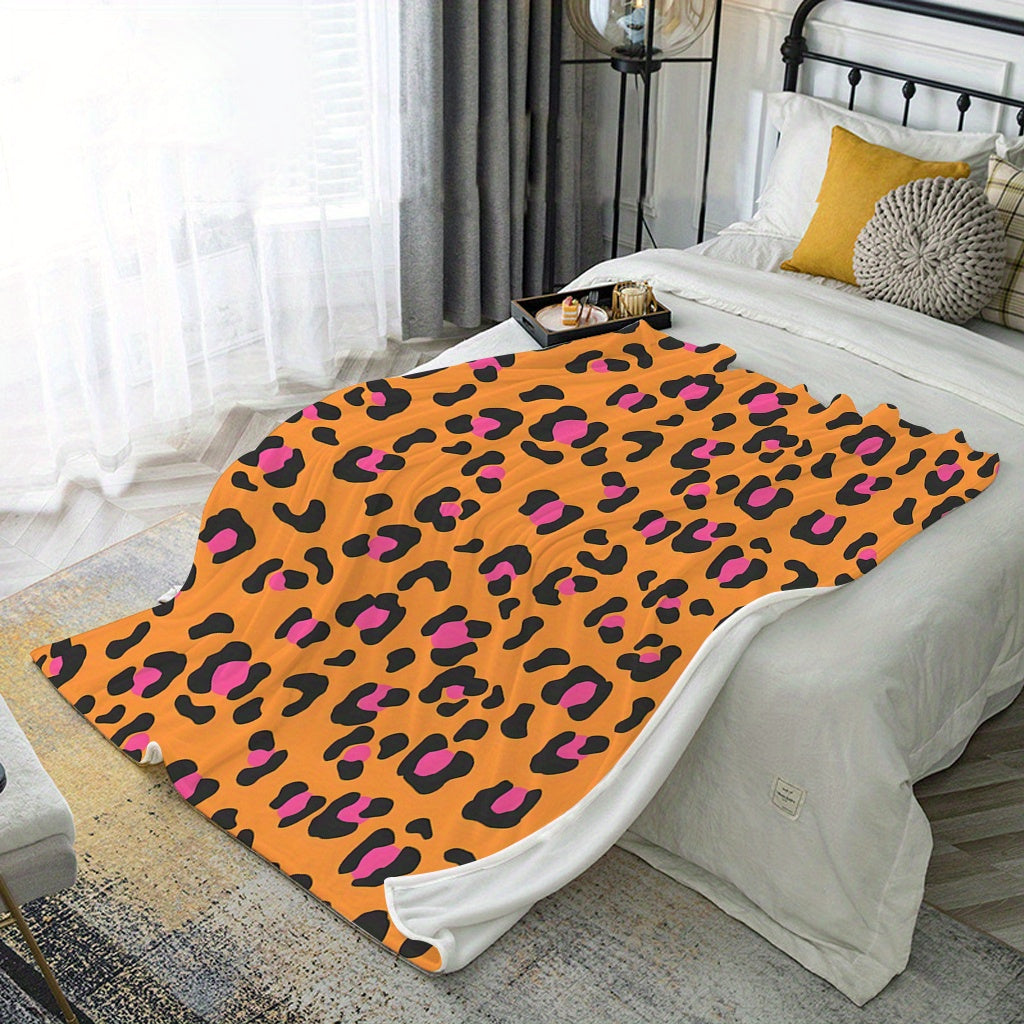 Soft and cozy flannel fleece blanket with a contemporary design. Suitable for all seasons, this blanket is machine washable and features a digital print orange leopard pattern. Made with a polyester cover, this warm plush blanket weighs 200-250gsm and is