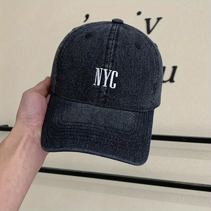 Casual-style denim baseball cap with embroidered NYC logo, adjustable unisex fashion hat for outdoor activities.