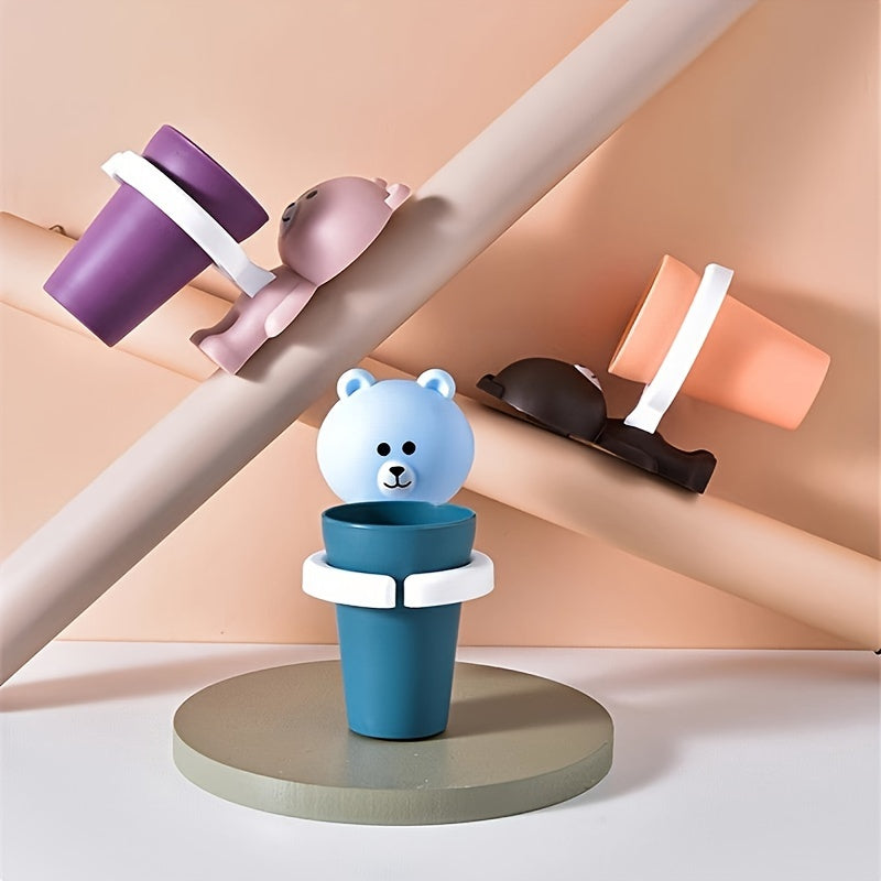 Wall-mounted bear toothbrush holder with cup - no drilling, space-saving bathroom organizer.