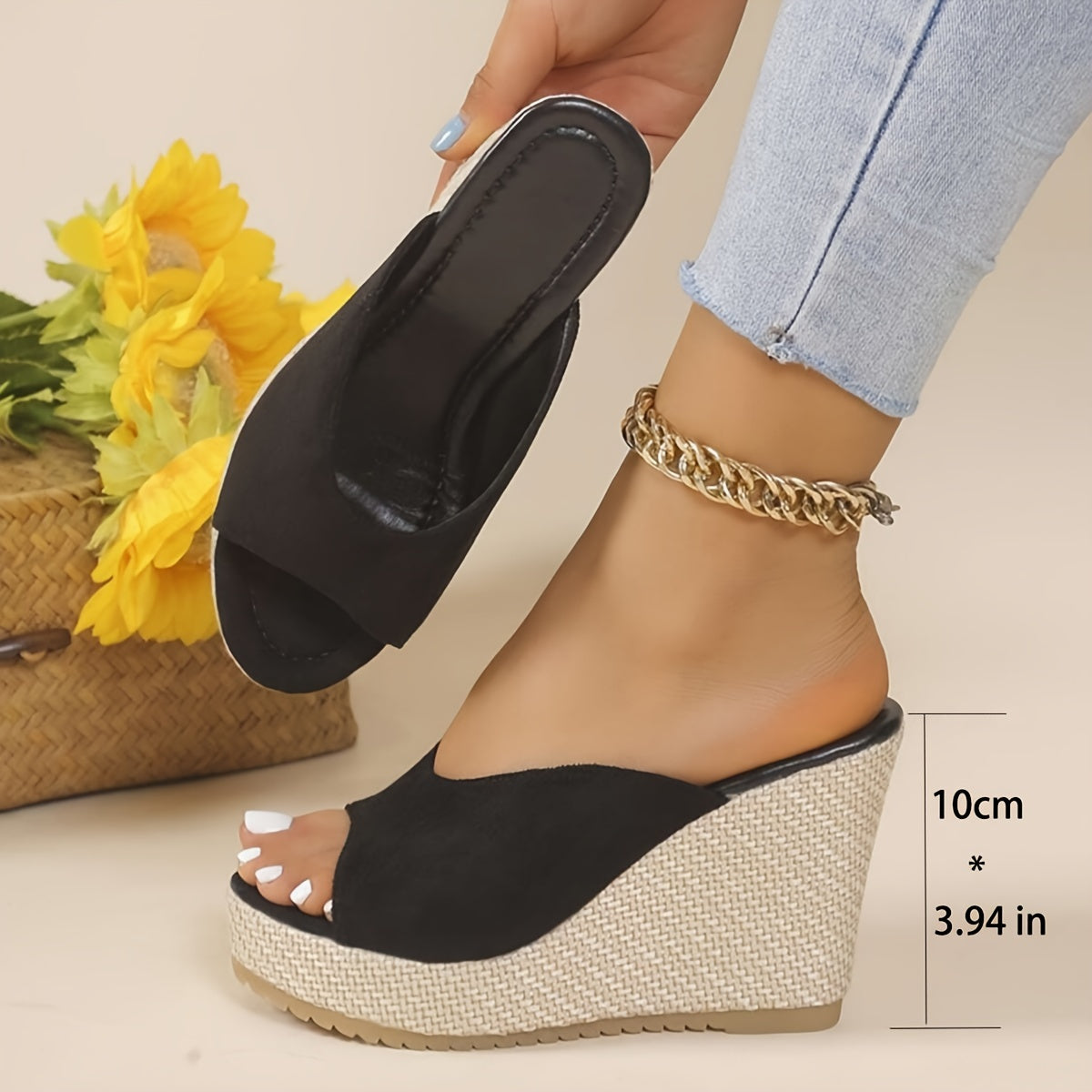 Black slip-on wedge sandals for women with an open toe, high heel, comfortable ankle strap, and woven design sole - perfect for casual summer wear.